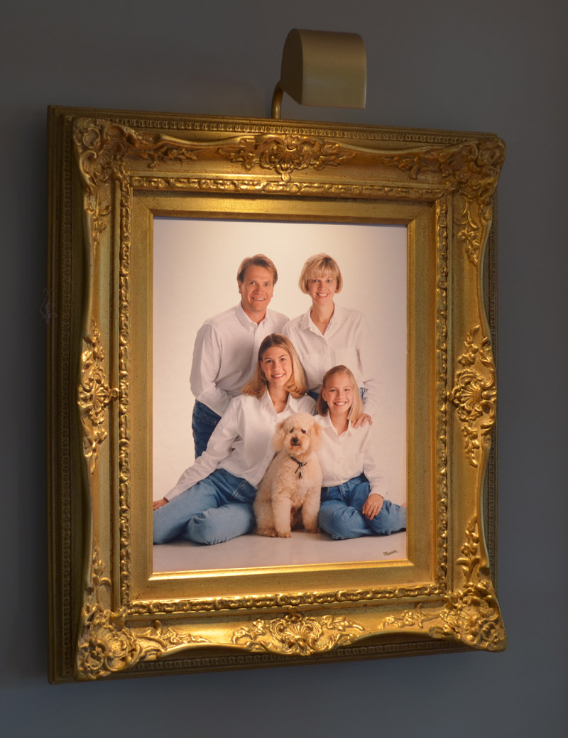 very small picture light on family photo